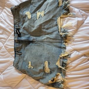 Express medium blue jean color distressed skirt size 16 new